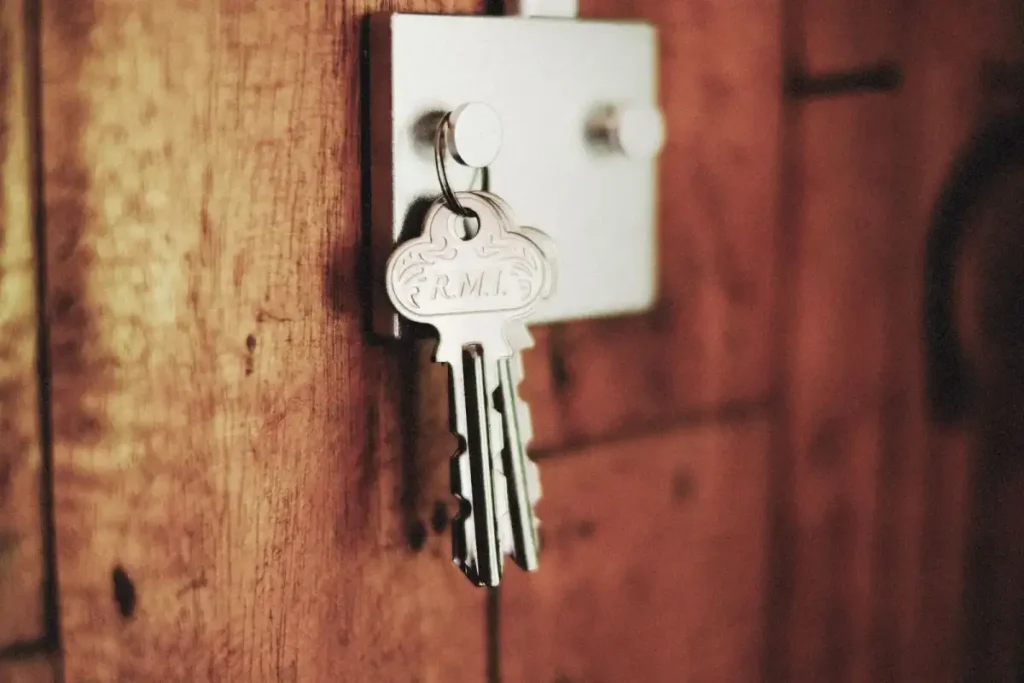 Key in the lock of a timber door – testing a new door lock after you replace it, how to replace a door lock in Boston with Big Locksmiths Boston