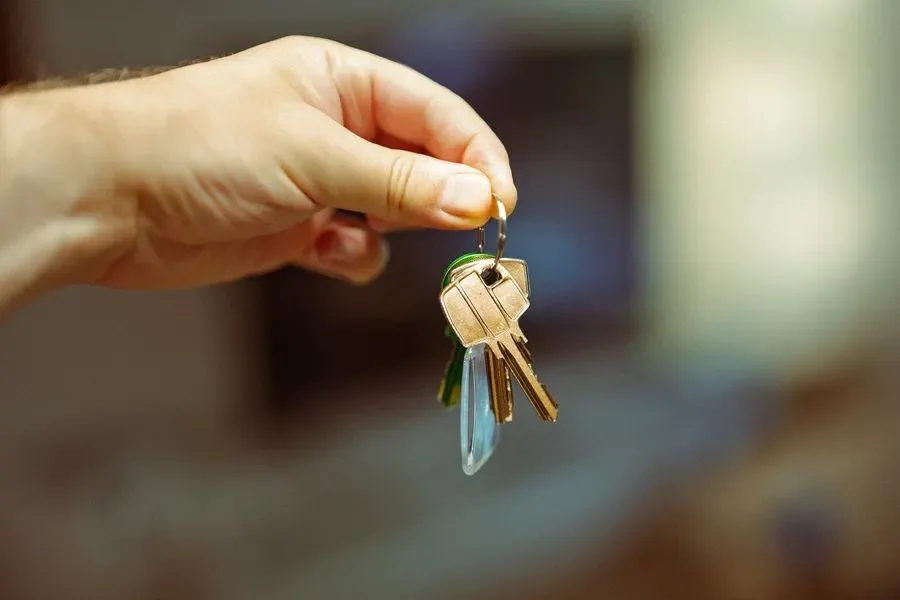Hand holding a set of house keys – residential locksmith Boston help for landlords and letting agents from Locksmith Boston